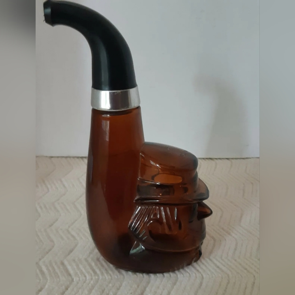 Vintage Avon Cologne Perfume Bottle in the shape of a pipe. Whit monkey  face